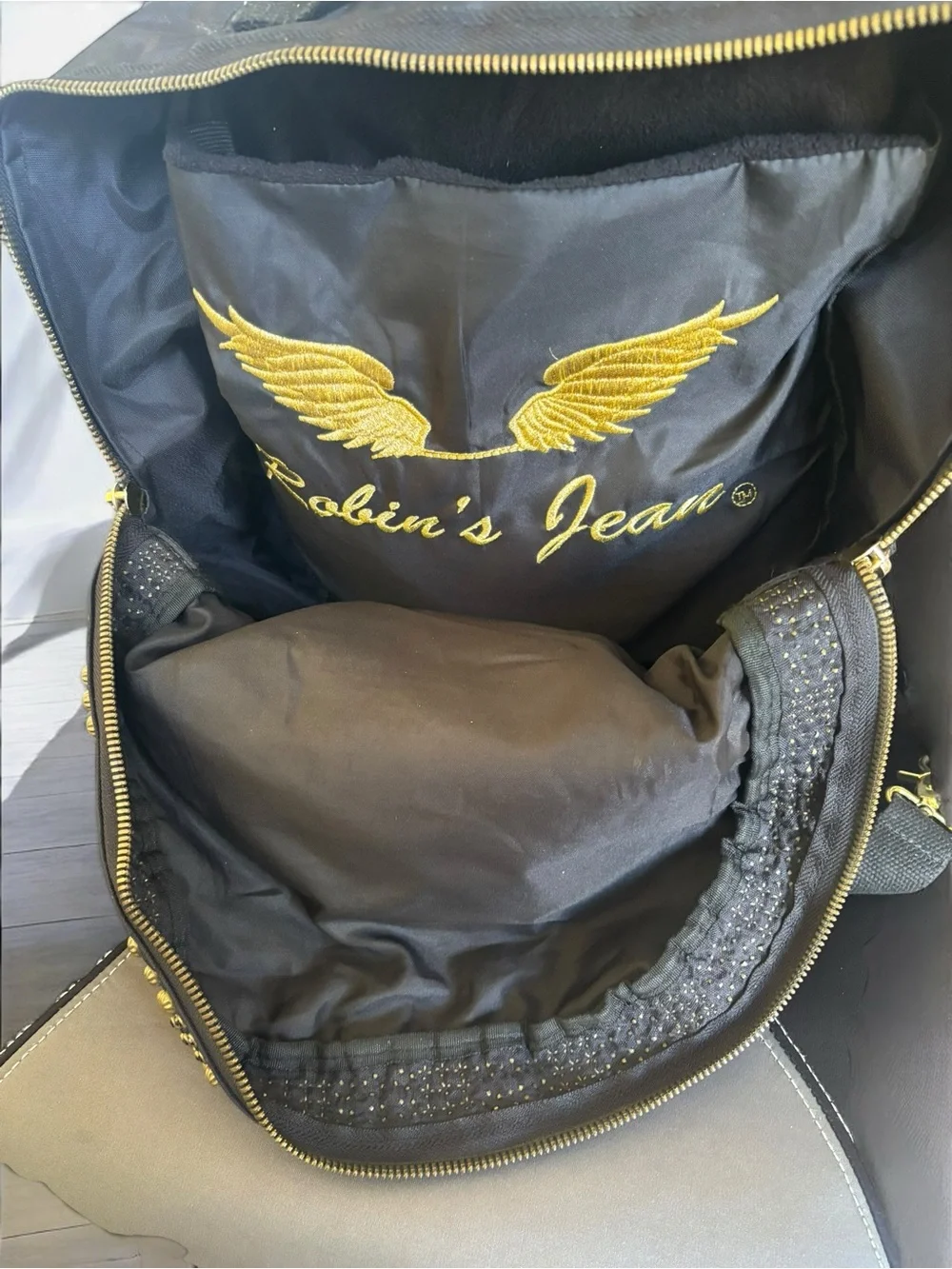 Jean Studded Backpack designed with an edgy  streetwear aesthetic.